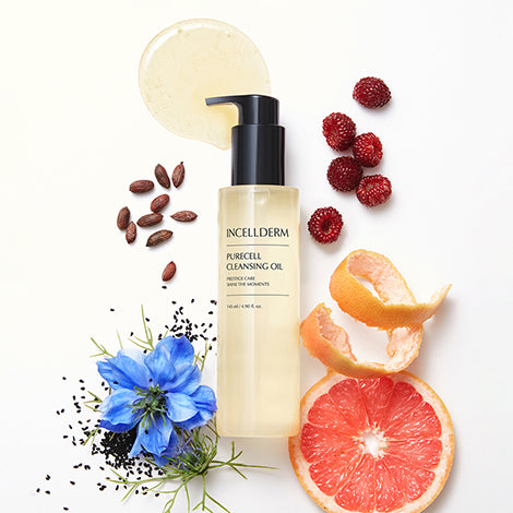 Incellderm Purecell Cleansing Oil bottle with golden oil droplets on clean, glowing skin.