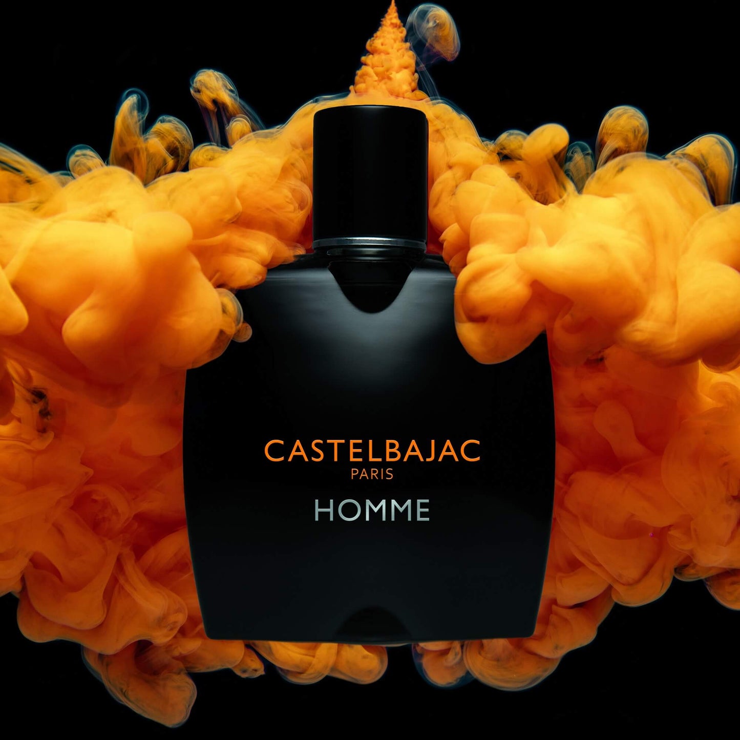 Castelbajac Paris HOMME Eau de Parfum bottle with sleek design and golden liquid, set against a backdrop of urban sophistication and citrus groves
