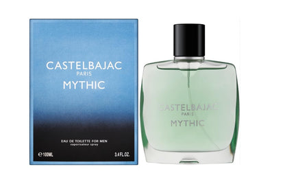 Castelbajac Paris Mythic Eau de Parfum in a sleek blue glass bottle, radiating sophistication against a backdrop of cedar forests and ocean horizons