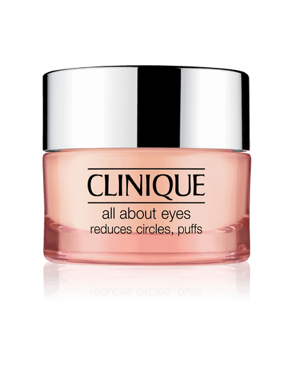 Clinique All About Eyes Rich Cream jar with cream dabbed onto a ring finger, highlighting gentle application for the delicate eye area